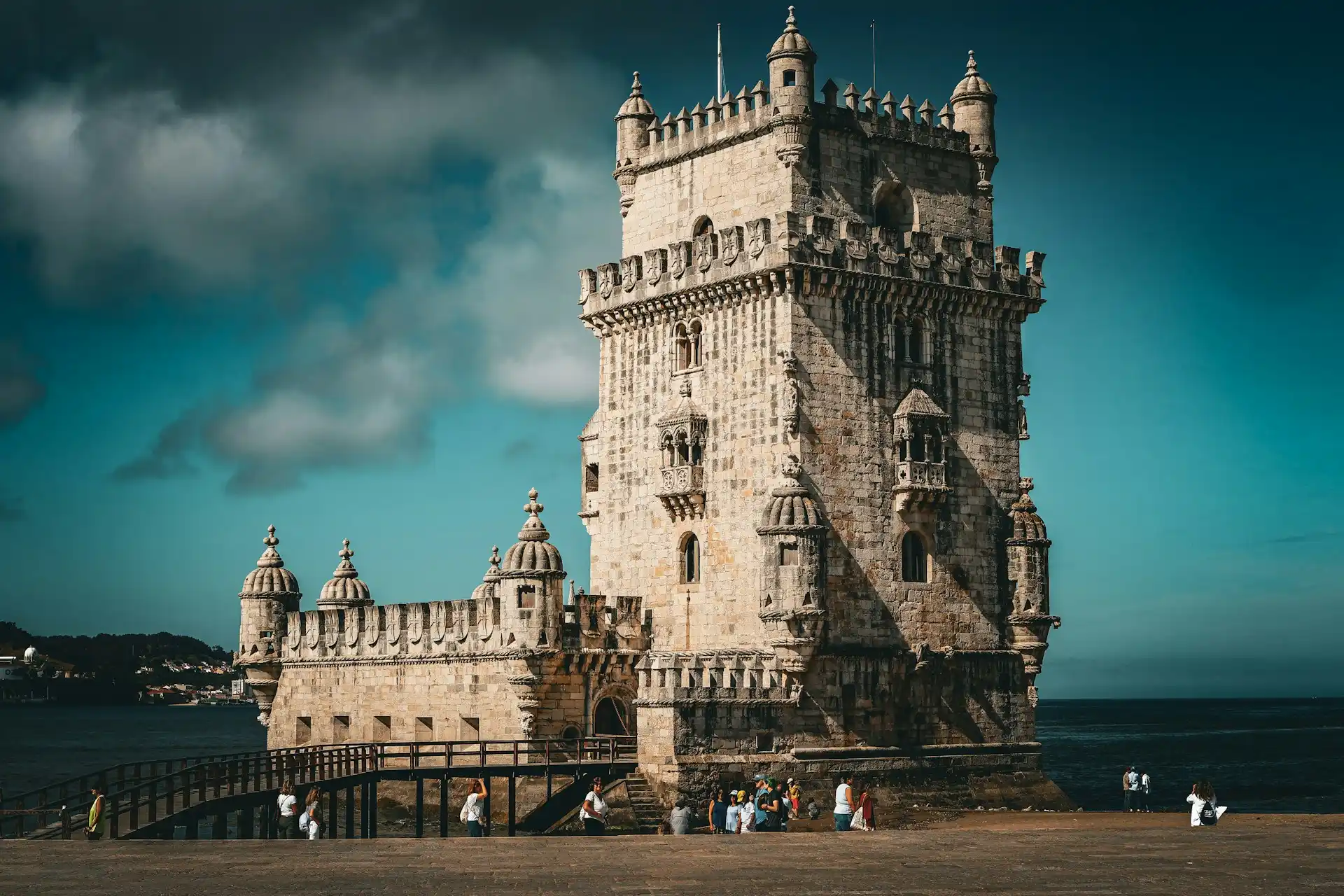 Travel guide to Portugal featuring Belém Tower and Lisbon skyline