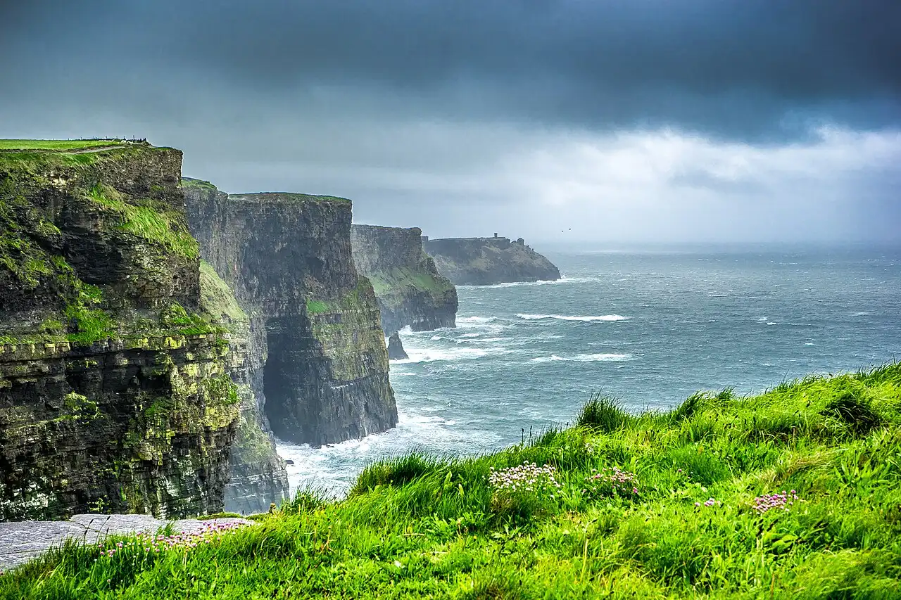 Travel guide to Ireland featuring the Cliffs of Moher and Atlantic coastline