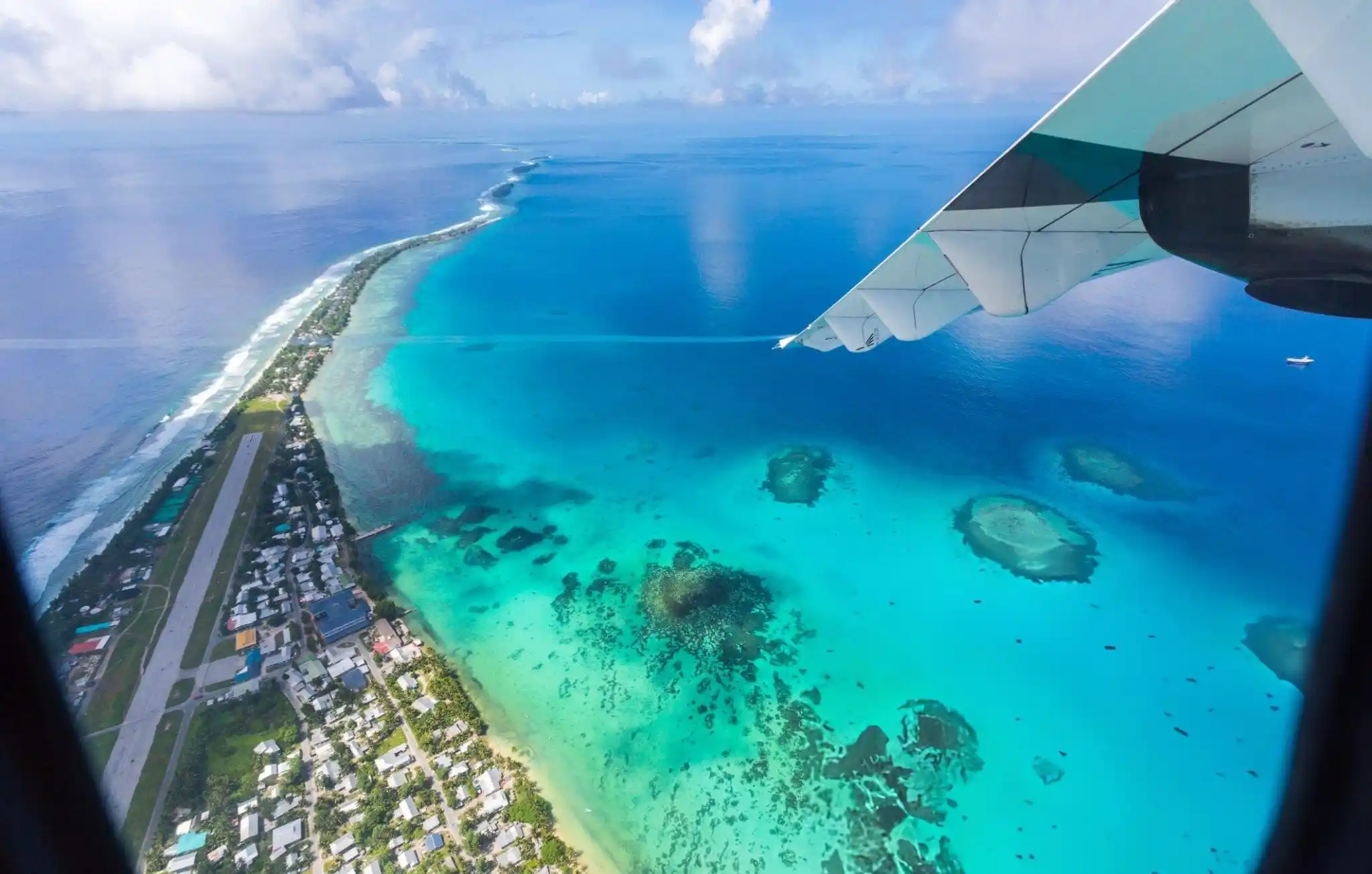 Travel guide to Tuvalu featuring Funafuti lagoon and palm-fringed beaches