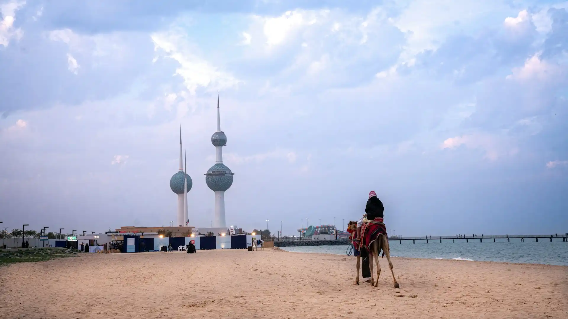 Travel guide to Kuwait featuring the iconic Kuwait Towers along the Arabian Gulf coast