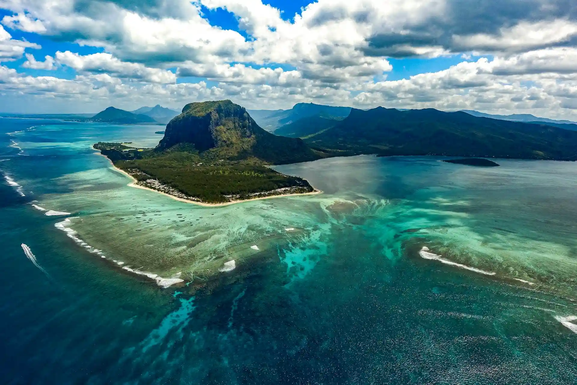 Travel guide to Mauritius featuring Le Morne Brabant and turquoise waters
