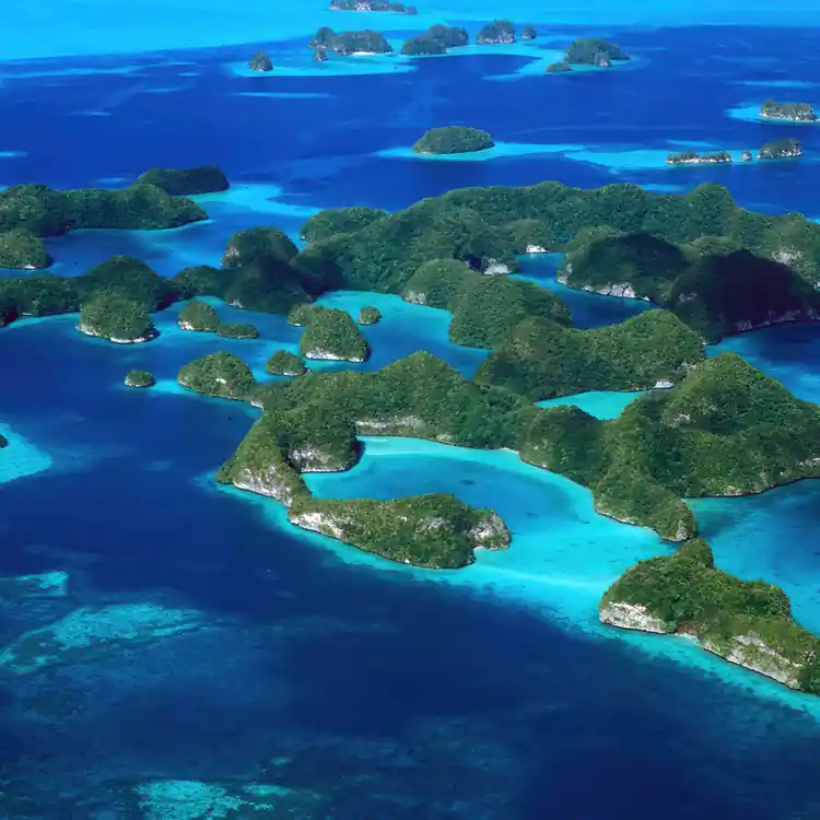 Travel guide to Palau featuring the aerial view of the Rock Islands