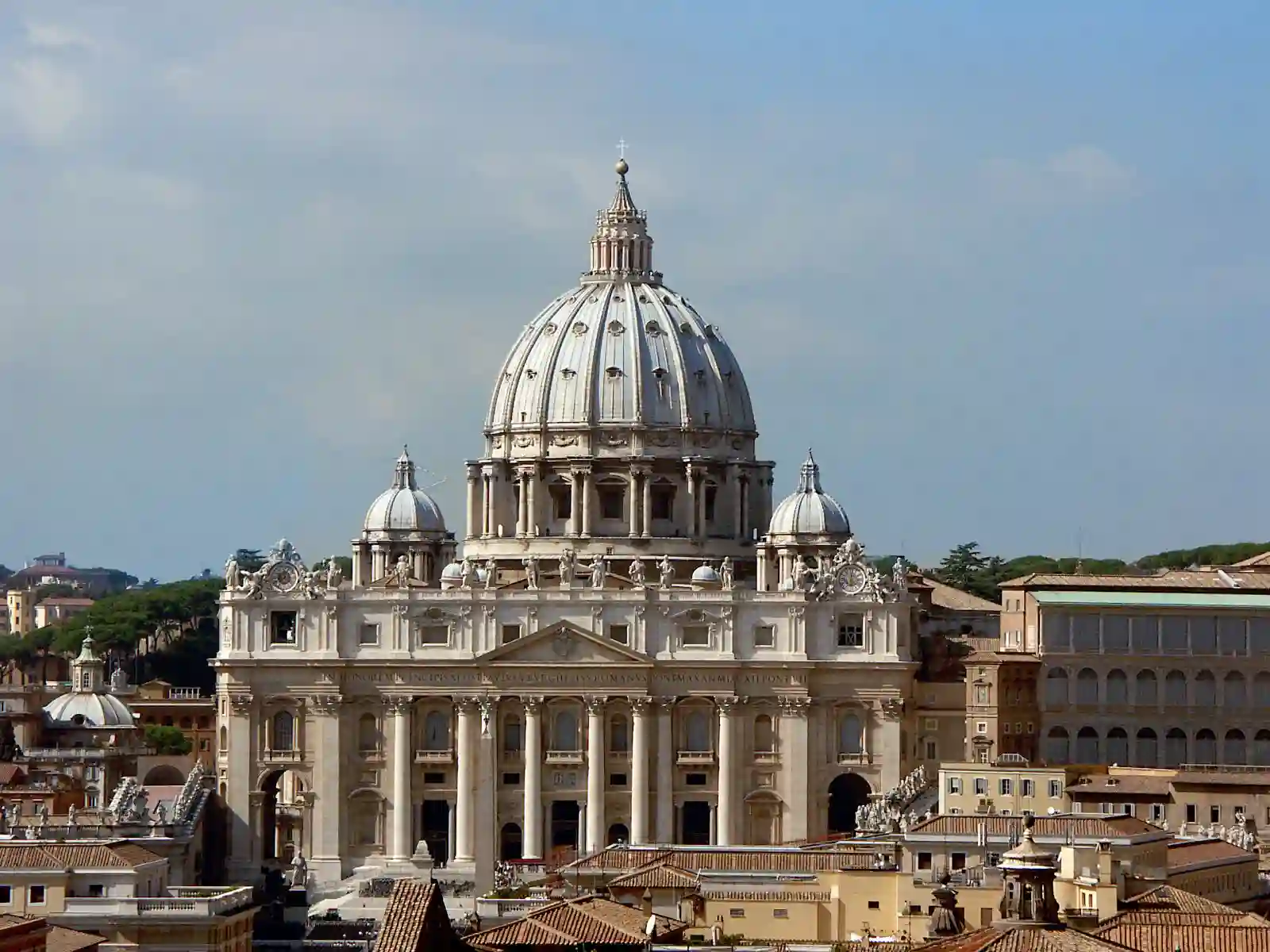 Travel guide to Vatican City featuring St. Peter's Basilica and Bernini's colonnade