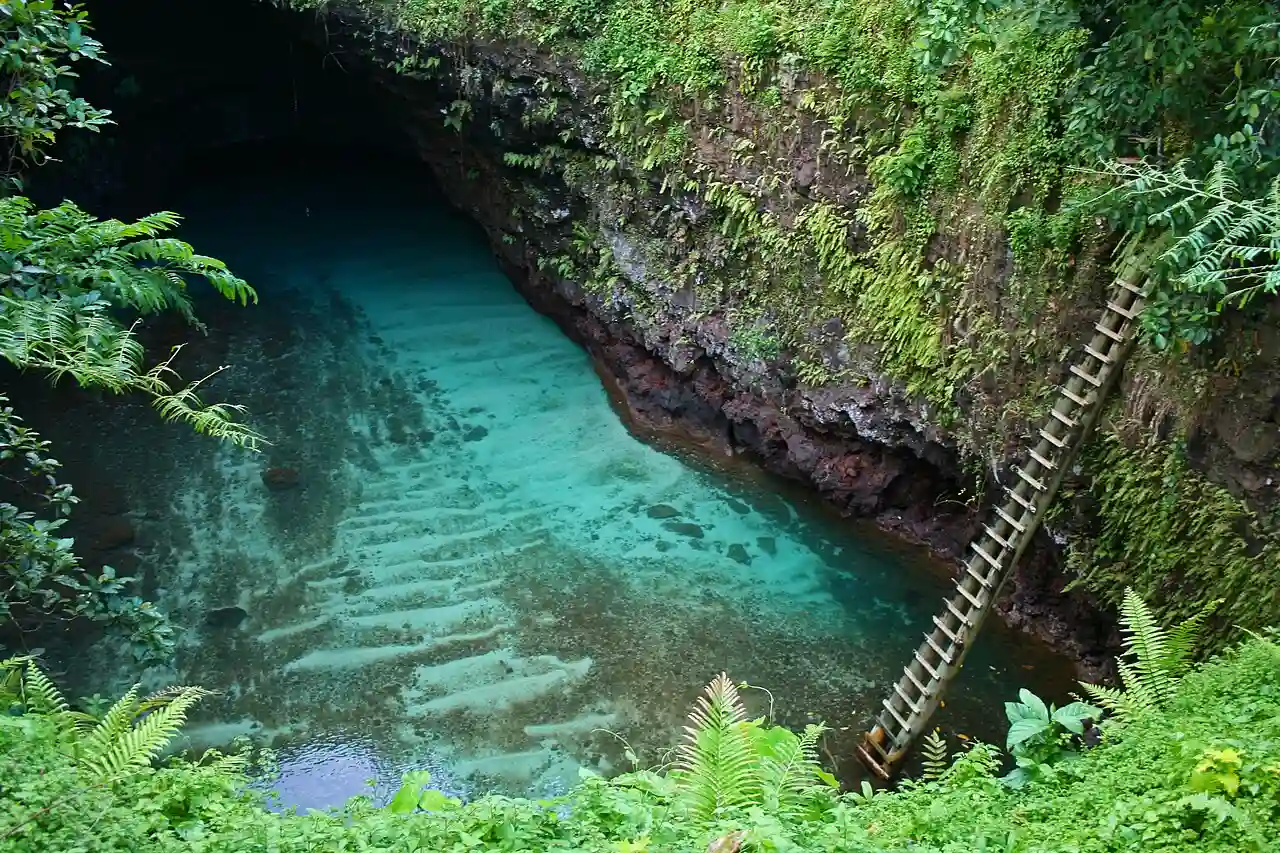 Travel guide to Samoa featuring the To-Sua Ocean Trench and tropical landscape