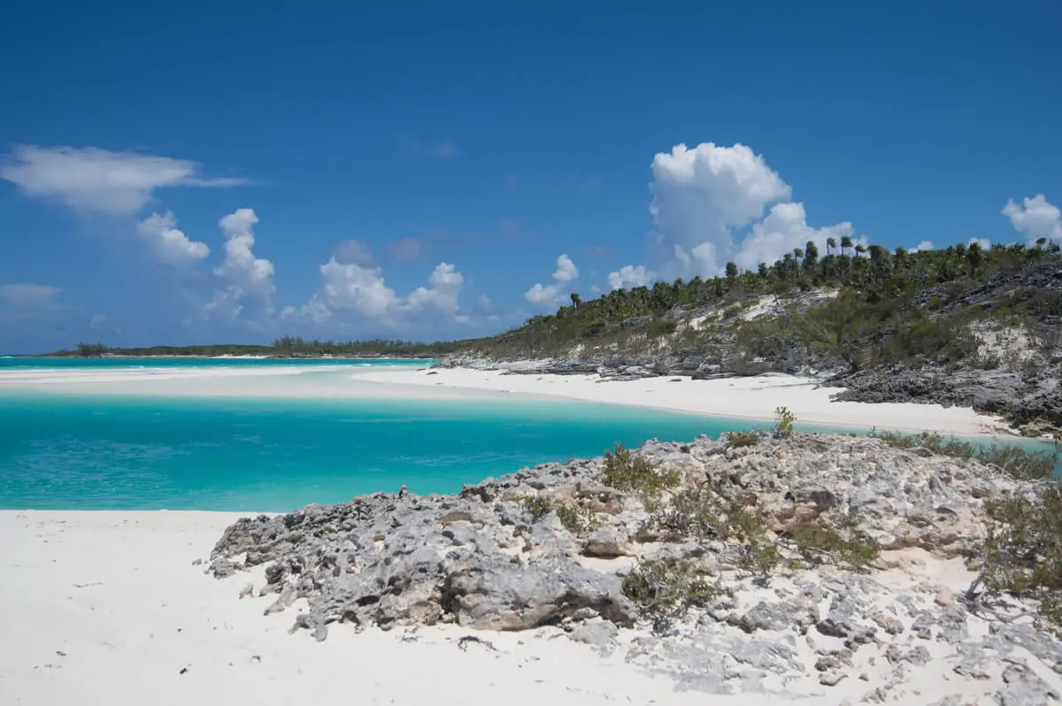 Travel guide to The Bahamas featuring vibrant turquoise ocean waters and coral cays of the Exumas